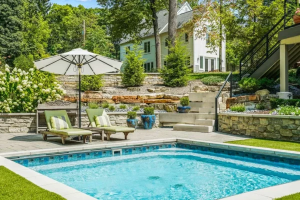 Using Landscaping to Create a Natural Inground Pool Perimeter